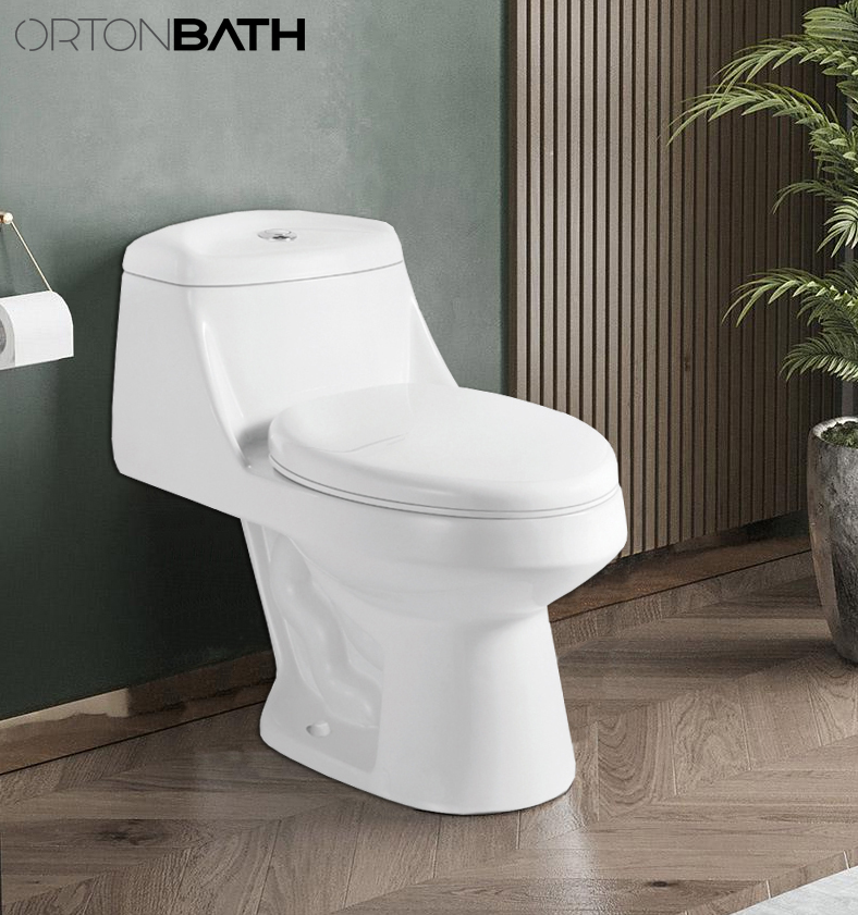 Inodoro elongado de una pieza dual flush C/asiento caida lenta y descarga 1.28gpf/4.8lpf marca OrtonBath